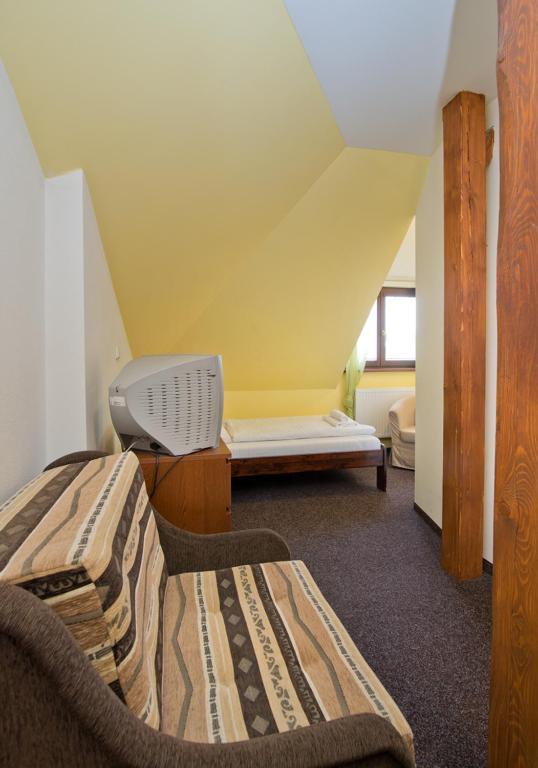 Hotel U Zlateho Byka Písek Стая снимка