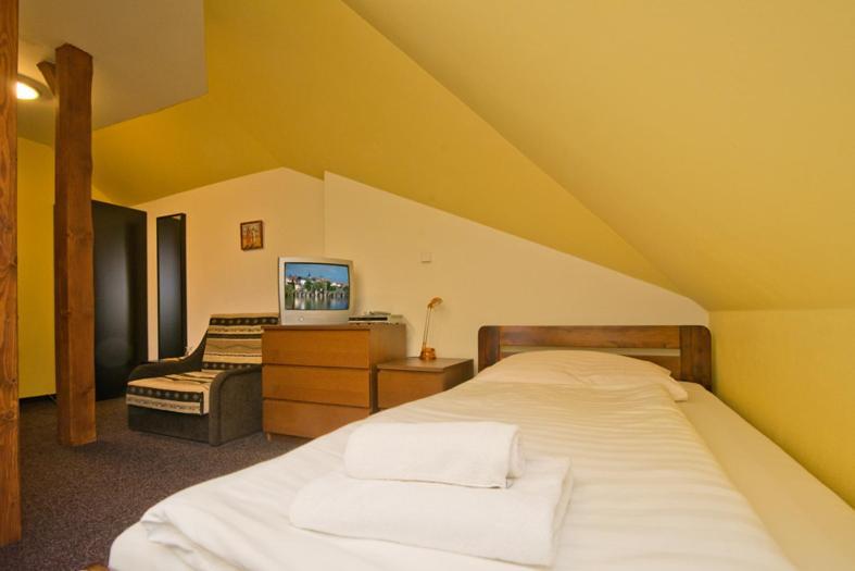 Hotel U Zlateho Byka Písek Стая снимка