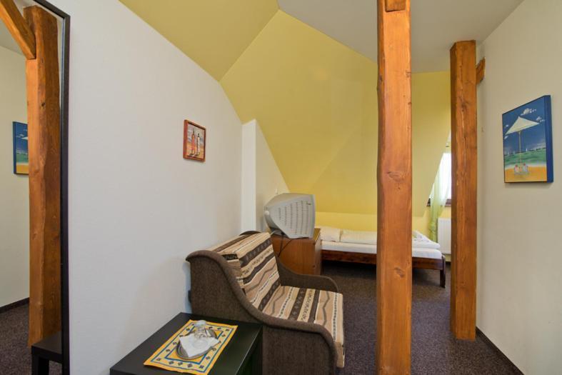 Hotel U Zlateho Byka Písek Стая снимка